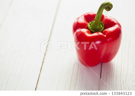 Fresh red pepper on wooden table 133843123