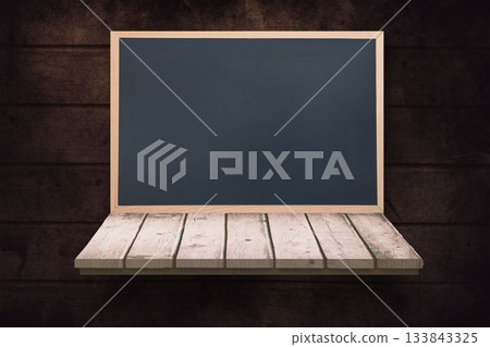 Blackboard on a wooden shelf 133843325
