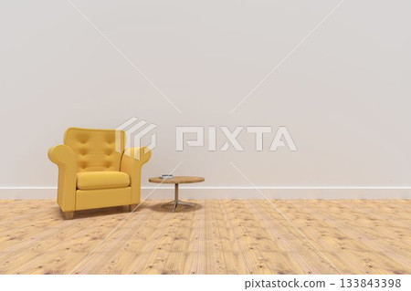 Yellow armchair by table on hardwood floor against wall Yellow armchair by table on hardwood floor against wall 133843398