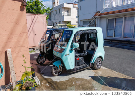 Electric tuk-tuks (tricycles with a simple roof that are unique to Southeast Asia) are available for rental. Electric tuk-tuks (tricycles with a simple roof that are unique to Southeast Asia) are available for rental. 133843805