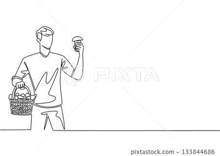 Single one line drawing a man carrying a rattan basket filled with mushrooms in one hand. Surprised. Get blessings. Edible. National Mushroom Hunting Day. Continuous line design graphic illustration 133844686