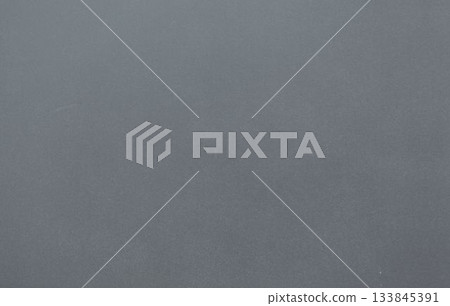 Grey textured surface is covering entire canvas in flat design, showing subtle shade variations Grey textured surface is covering entire canvas in flat design, showing subtle shade variations 133845391