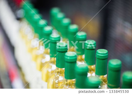 Bottles of wine arranged at supermarket 133845530