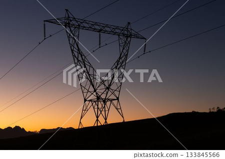 The evening electricity pylon silhouette The evening electricity pylon silhouette 133845566