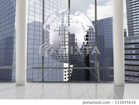 Silver globe floating in room Silver globe floating in room 133845639