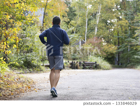 A man in his 50s running 133846029