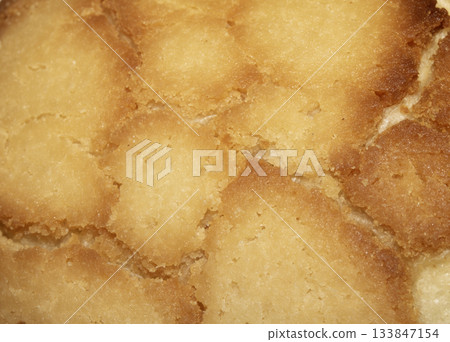Close up of home made bread roll texture tiger pattern Close up of home made bread roll texture tiger pattern 133847154