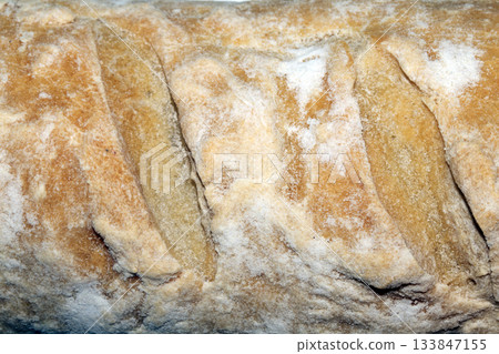 Close up of home made bread rolls baguette loaf fresh cooked Close up of home made bread rolls baguette loaf fresh cooked 133847155