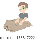 Wombat receiving a massage from a male masseuse 133847222