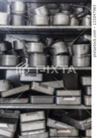 Utensils on shelf in commercial kitchen Utensils on shelf in commercial kitchen 133847965