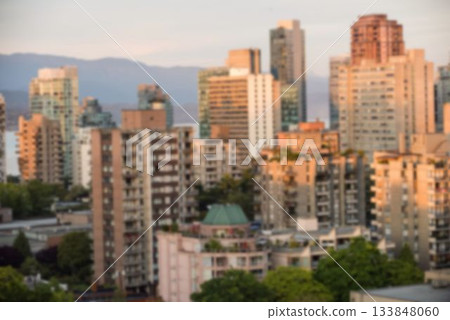 Blurry view of cityscape during summer Blurry view of cityscape during summer 133848060