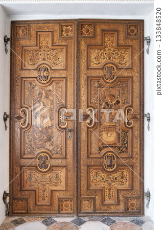 Ornate Carved Wooden Doors with Renaissance Motifs at Ambras Castle Innsbruck Austria Ornate Carved Wooden Doors with Renaissance Motifs at Ambras Castle Innsbruck Austria 133848520