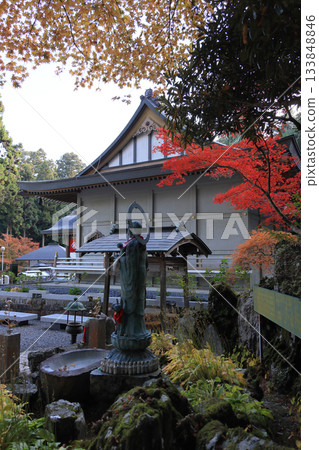 Unpenji Temple, the 66th temple of the Shikoku Pilgrimage, with Mizuko Jizo and autumn leaves near the main hall Unpenji Temple, the 66th temple of the Shikoku Pilgrimage, with Mizuko Jizo and autumn leaves near the main hall 133848846