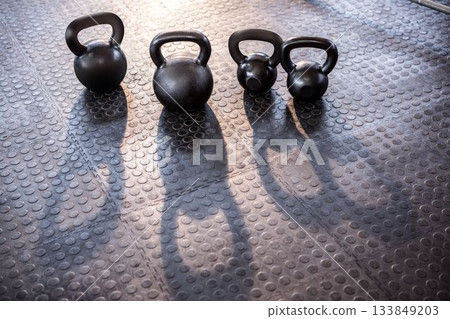 Weights on the studio floor Weights on the studio floor 133849203