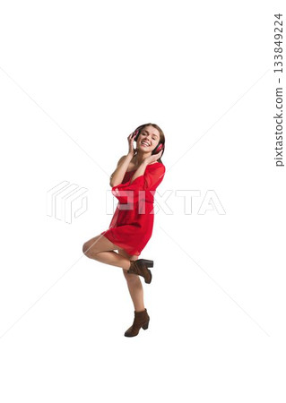 Pretty young girl listening to music Pretty young girl listening to music 133849224