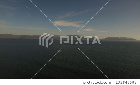 Idyllic view of sea against sky 133849595