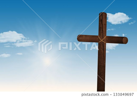 Flat design is showing rope-bound wooden cross against blue sky with sun rays and clouds Flat design is showing rope-bound wooden cross against blue sky with sun rays and clouds 133849697