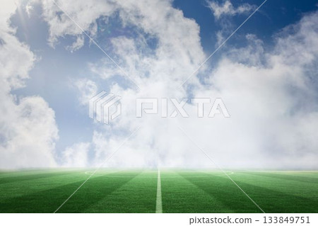 Football pitch under blue sky Football pitch under blue sky 133849751