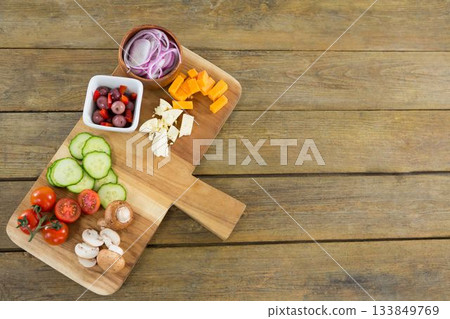 Chopped vegetables on cutting board 133849769