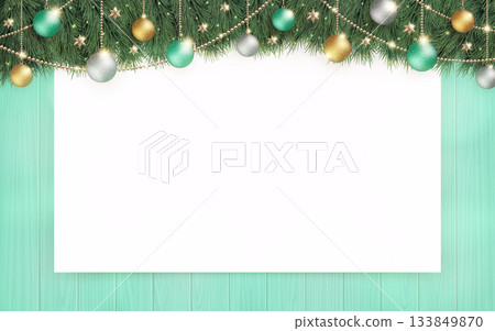 Shining Christmas tree and plain white board on turquoise wood background Shining Christmas tree and plain white board on turquoise wood background 133849870