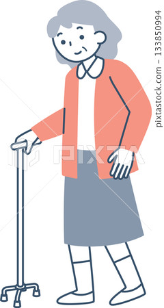 Senior woman walking with a cane 133850994