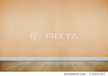Empty room being shown in flat design, featuring beige wall above white baseboard and wooden floor Empty room being shown in flat design, featuring beige wall above white baseboard and wooden floor 133851457