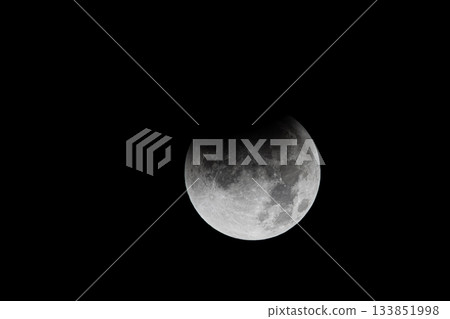 A total lunar eclipse floating in the night sky A total lunar eclipse floating in the night sky 133851998