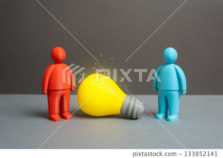Unite around an idea. Partner to achieve a goal. A lightbulb of an idea between people. Teamwork inspiration, creative collaboration and innovation culture in organizations. Unite around an idea. Partner to achieve a goal. A lightbulb of an idea between people. Teamwork inspiration, creative collaboration and innovation culture in organizations. 133852141