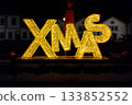 Yellow XMAS decoration illuminated by night 133852552