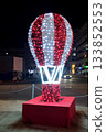 Red and white hot air balloon decoration illuminated by night 133852553