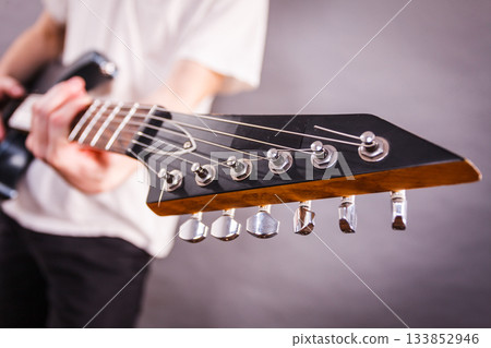 Close up on guitar fretboard 133852946