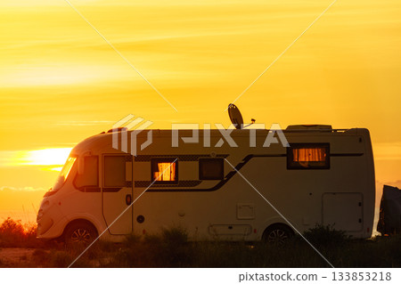 Caravan on nature in the morning at sunrise Caravan on nature in the morning at sunrise 133853218