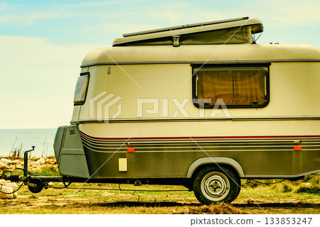 Caravan trailer camping on coast, Spain. 133853247