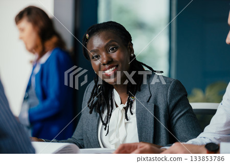 Black Female Manager Providing Feedback to Junior Employee in Multicultural Office Black Female Manager Providing Feedback to Junior Employee in Multicultural Office 133853786