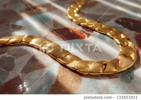 Elegant Gold Chain on Marble Surface Reflecting Sunlight - Jewelry Design Inspiration Generative AI Elegant Gold Chain on Marble Surface Reflecting Sunlight - Jewelry Design Inspiration Generative AI 133853931