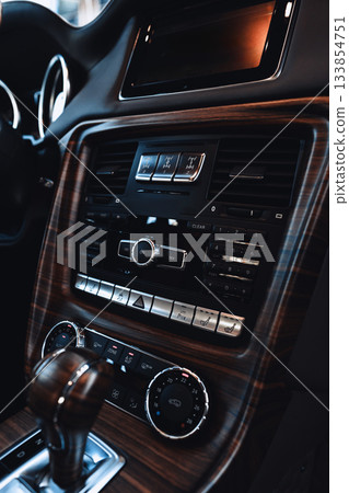 Luxury car interior with modern dashboard and sleek design features 133854751