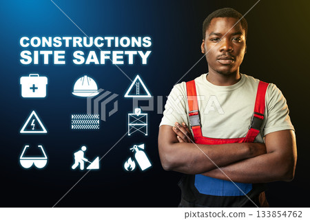 Construction worker promotes safety awareness at a job site with informative symbols 133854762