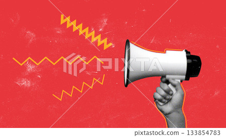 Hand holding a megaphone delivering a message in a vibrant setting 133854783