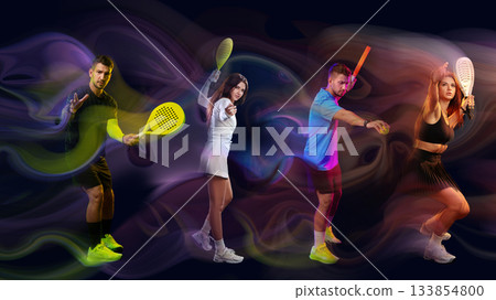 Players showcase their skills in an electrifying paddle tennis match at night 133854800