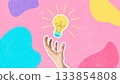Creative hand reaching for a light bulb on a colorful background in a vibrant design 133854808