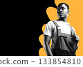 Young man wearing overalls poses confidently against a bright bold background 133854810