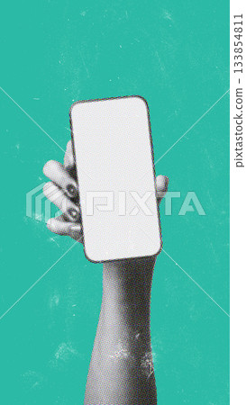 Hand holding blank smartphone against a vibrant teal background in modern design Hand holding blank smartphone against a vibrant teal background in modern design 133854811