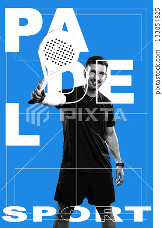 Man playing paddle sport with racket on blue background showing enthusiasm for the game 133854825