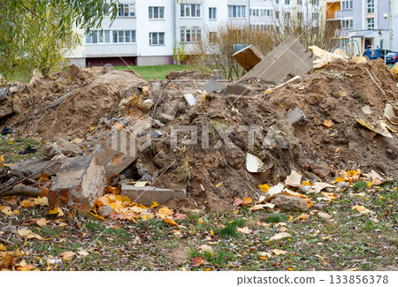 Sand and construction waste from home renovations. Waste sorting, hazardous waste disposal at the construction site, 133856378