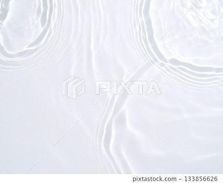 Background material of ripples spreading on the water surface. White. Clean. Natural. Beauty-related. Background material of ripples spreading on the water surface. White. Clean. Natural. Beauty-related. 133856626