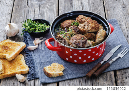 Frikadellen, Minced Meat Patties in a red pot Frikadellen, Minced Meat Patties in a red pot 133856922