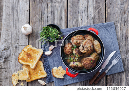 Frikadellen, Minced Meat Patties in a red pot 133856927