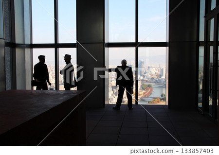 Figures on the observation deck of Station One of the Yodoyabashi Twin Towers Figures on the observation deck of Station One of the Yodoyabashi Twin Towers 133857403