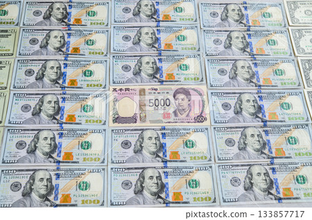 US dollar 100 dollar bill, Japanese yen 5000 yen bill surrounded by men, female leader, middle US dollar 100 dollar bill, Japanese yen 5000 yen bill surrounded by men, female leader, middle 133857717