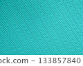 Blue background with diagonal wavy curve macro pattern with rough texture 133857840